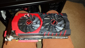 This is the MSI R9 390 sitting on my lap. I'm a full grown man, this thing is HUGE!